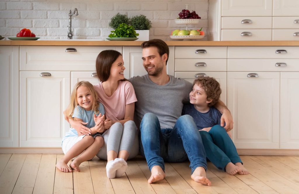 Happy Family in the kitchen with children En3rgy Solution